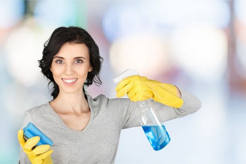 Cleaning technician treating a carpeted area