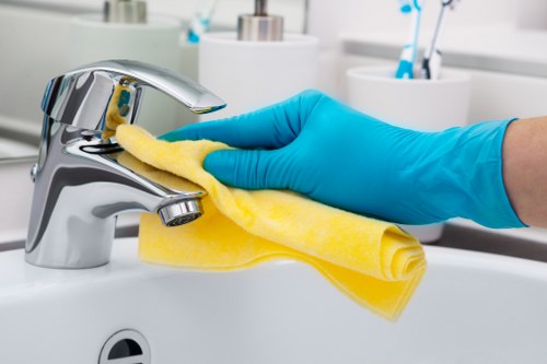 Technician using professional carpet cleaning machine with caution